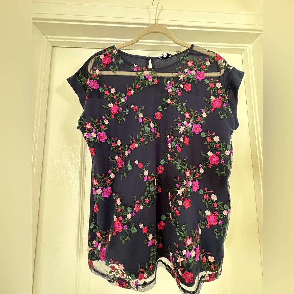 A British brand ‘Next’  navy top with Floral embroidery.